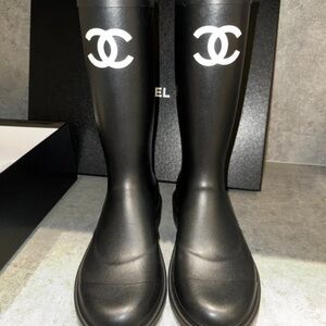 CHANEL Black Boots with White Emblem